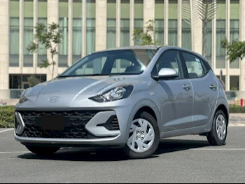 هيونداي  اي  10  2024  اوتوماتيك  0 كم  4 سلندر  سحب امامي  هاتشباك  فضي  تحت الضمان