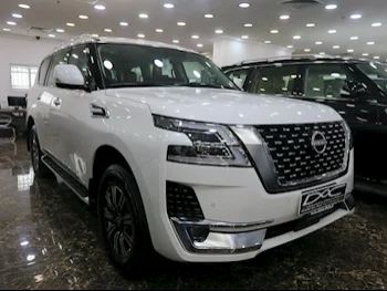 Nissan  Patrol  Titanium  2024  Automatic  0 Km  6 Cylinder  Four Wheel Drive (4WD)  SUV  White  With Warranty