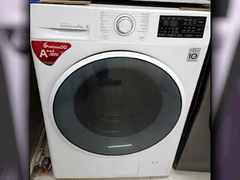 غسالة ملابس & الكل في واحد ال جي \  غسالة تحميل أمامي  أبيض