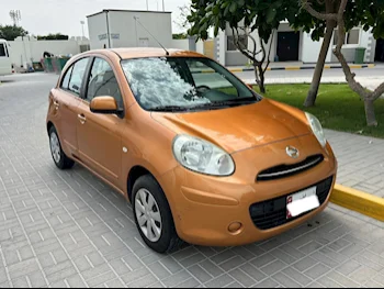 Nissan  Micra  2012  Automatic  51,200 Km  3 Cylinder  Hatchback  Gold