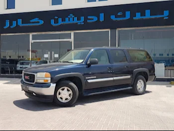 GMC  Suburban  2005  Automatic  260,000 Km  8 Cylinder  Four Wheel Drive (4WD)  SUV  Blue