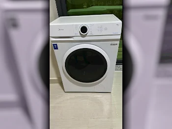 غسالة ملابس & الكل في واحد ميديا \  غسالة تحميل أمامي  أبيض