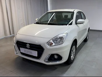 Suzuki  Dzire  2022  Automatic  69,700 Km  4 Cylinder  Front Wheel Drive (FWD)  Sedan  White