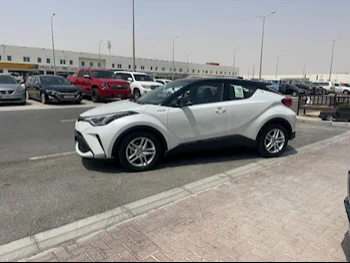 Toyota  C-HR  HIBRID  2023  Automatic  9,000 Km  4 Cylinder  Rear Wheel Drive (RWD)  SUV  White  With Warranty