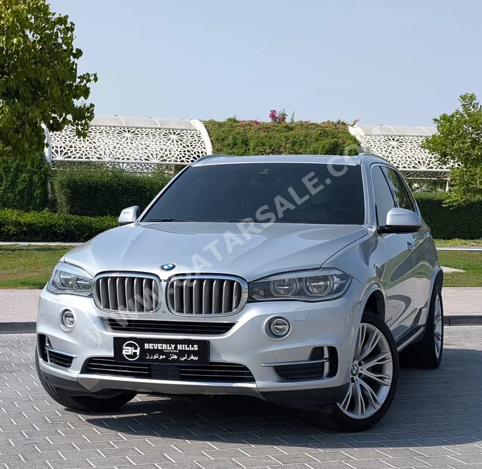 BMW  X-Series  X5 M50i  2014  Automatic  119,675 Km  8 Cylinder  All Wheel Drive (AWD)  SUV  Silver