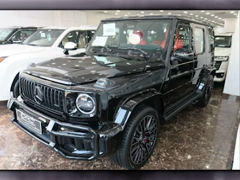 مرسيدس - بنز  جي - كلاس  63 اي ام جي  2025  اوتوماتيك  0 كم  8 سلندر  دفع رباعي  اس يو في  أسود  تحت الضمان