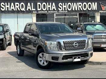 Nissan  Titan  2017  Automatic  239,000 Km  8 Cylinder  Four Wheel Drive (4WD)  Pick Up  Gray