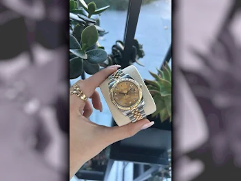 ساعات - رولكس  - ساعات ميكانيكية  - ذهب  - ساعات نسائي