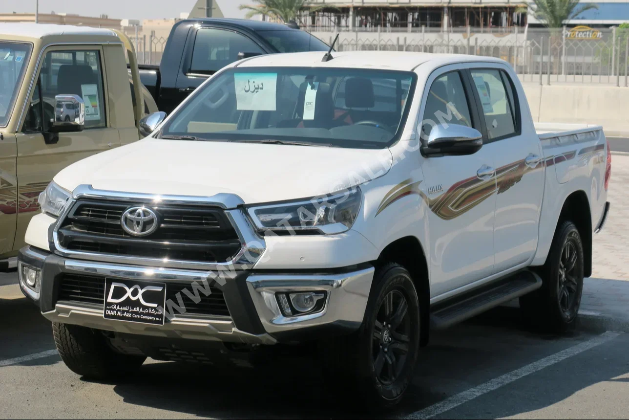 Toyota  Hilux  2024  Automatic  0 Km  4 Cylinder  Four Wheel Drive (4WD)  Pick Up  White  With Warranty