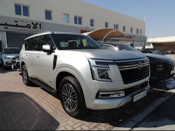 Nissan  Patrol  Titanium  2025  Automatic  0 Km  6 Cylinder  Four Wheel Drive (4WD)  SUV  White  With Warranty