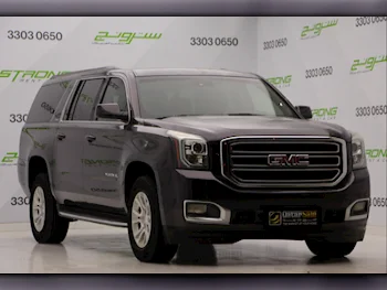 GMC  Yukon  XL  2015  Automatic  124,000 Km  8 Cylinder  Four Wheel Drive (4WD)  SUV  Purple