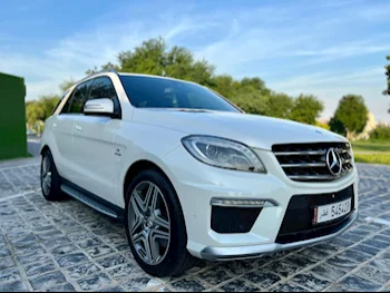 Mercedes-Benz  ML  63 AMG  2014  Automatic  80,000 Km  8 Cylinder  Four Wheel Drive (4WD)  SUV  White