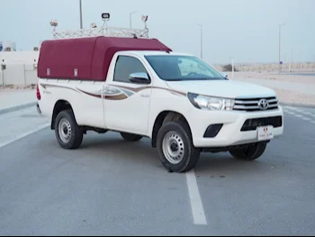 Toyota  Hilux  SR5  2019  Automatic  58,000 Km  4 Cylinder  Four Wheel Drive (4WD)  Pick Up  White