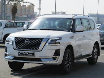 Nissan  Patrol  Titanium  2023  Automatic  8,000 Km  6 Cylinder  Four Wheel Drive (4WD)  SUV  White  With Warranty