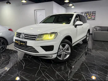 Volkswagen  Touareg  2015  Automatic  134,000 Km  6 Cylinder  All Wheel Drive (AWD)  SUV  White
