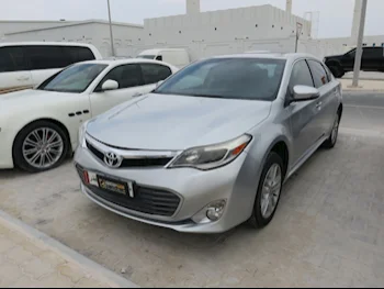 Toyota  Avalon  XLE  2014  Automatic  130,000 Km  6 Cylinder  Front Wheel Drive (FWD)  Sedan  Silver