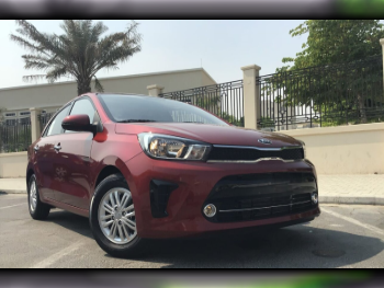 Kia  Pegas  4 Cylinder  Sedan  Red  2020