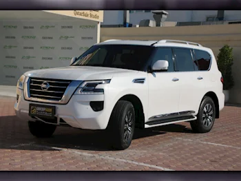 Nissan  Patrol  Titanium  2020  Automatic  100,000 Km  6 Cylinder  Four Wheel Drive (4WD)  SUV  White  With Warranty