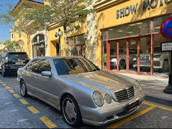 مرسيدس - بنز  اي - كلاس  55 AMG  2000  اوتوماتيك  169,000 كم  4 سلندر  دفع خلفي  سيدان  فضي