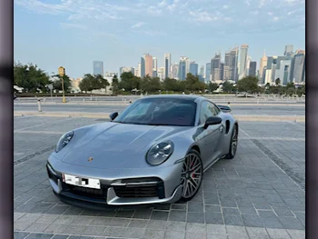 Porsche  911  Turbo  2021  Automatic  22,000 Km  6 Cylinder  Rear Wheel Drive (RWD)  Coupe / Sport  Gray  With Warranty