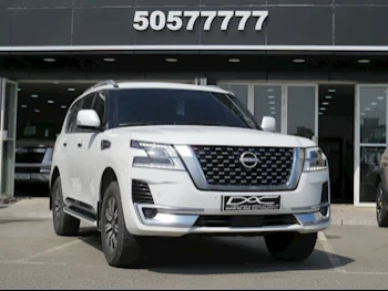 Nissan  Patrol  Titanium  2023  Automatic  52,000 Km  6 Cylinder  Four Wheel Drive (4WD)  SUV  White  With Warranty