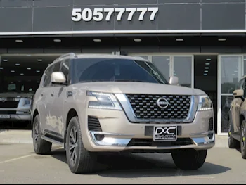Nissan  Patrol  Titanium  2022  Automatic  53,000 Km  6 Cylinder  Four Wheel Drive (4WD)  SUV  Gold  With Warranty
