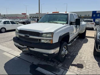 Chevrolet  Silverado  3500 HD  2003  Automatic  250,000 Km  8 Cylinder  Front Wheel Drive (FWD)  Pick Up  White