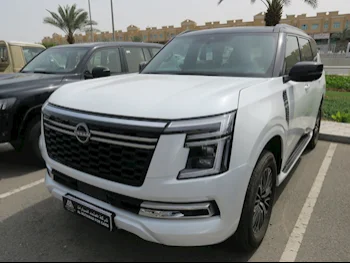 Nissan  Patrol  Titanium  2025  Automatic  7,000 Km  6 Cylinder  Four Wheel Drive (4WD)  SUV  White  With Warranty