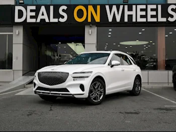 Genesis  GV 70  2023  Automatic  36,000 Km  4 Cylinder  Rear Wheel Drive (RWD)  SUV  White  With Warranty