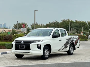 Mitsubishi  L 200  Diesel  2020  Manual  143,000 Km  4 Cylinder  Front Wheel Drive (FWD)  Pick Up  White