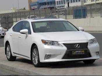  Lexus  ES  350  2014  Automatic  150,000 Km  6 Cylinder  Rear Wheel Drive (RWD)  Sedan  White  With Warranty