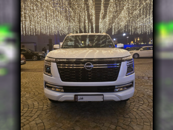 Nissan  Patrol  Titanium  2025  Automatic  300 Km  6 Cylinder  Four Wheel Drive (4WD)  SUV  White  With Warranty