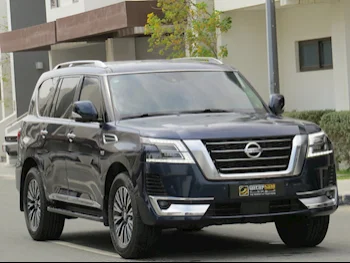 Nissan  Patrol  Titanium  2020  Automatic  65,000 Km  8 Cylinder  Four Wheel Drive (4WD)  SUV  Dark Blue  With Warranty