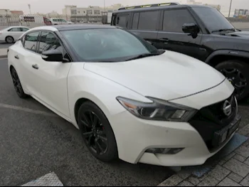 Nissan  Maxima  2016  Automatic  190,000 Km  6 Cylinder  Rear Wheel Drive (RWD)  Sedan  White