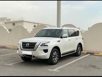 Nissan  Patrol  Titanium  2021  Automatic  89,000 Km  6 Cylinder  Four Wheel Drive (4WD)  SUV  White
