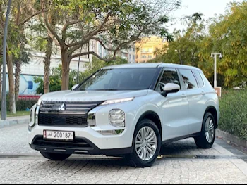Mitsubishi  Outlander  Limited edition  2024  Automatic  22,000 Km  4 Cylinder  All Wheel Drive (AWD)  SUV  White  With Warranty