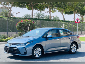 Toyota  Corolla  4 Cylinder  Sedan  Blue  2025