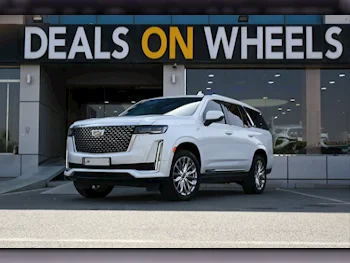 كاديلاك  اسكيليد  600  2021  اوتوماتيك  100,000 كم  8 سلندر  دفع رباعي  اس يو في  أبيض