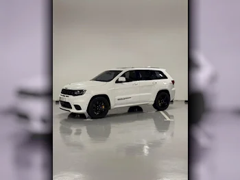 Jeep  Grand Cherokee  TrackHawk  2018  Automatic  39,000 Km  8 Cylinder  Four Wheel Drive (4WD)  SUV  White