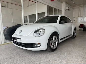 فوكس واغن  بيتل  2016  اوتوماتيك  59,000 كم  4 سلندر  دفع خلفي  هاتشباك  أبيض