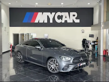 Mercedes-Benz  E-Class  200 AMG  2021  Automatic  76,000 Km  4 Cylinder  Rear Wheel Drive (RWD)  Coupe / Sport  Gray