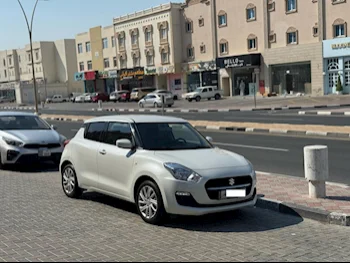 سوزوكي  سويفت  هاتش باك  أبيض  2024