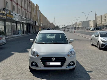 سوزوكي  دي زاير  سيدان  أبيض  2024