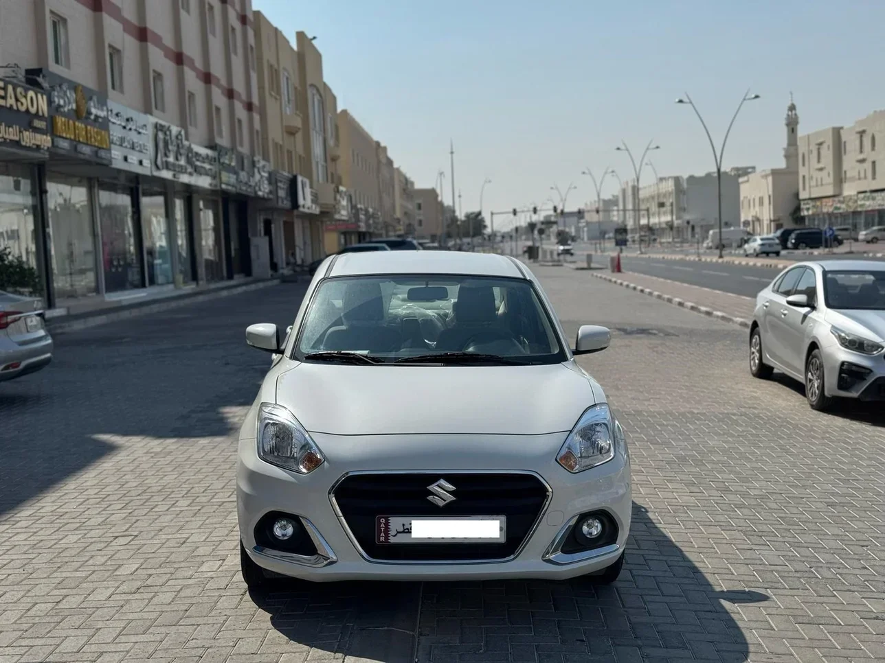 سوزوكي  دي زاير  سيدان  أبيض  2024