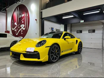 Porsche  911  Turbo S  2023  Automatic  7,000 Km  6 Cylinder  Rear Wheel Drive (RWD)  Coupe / Sport  Yellow  With Warranty