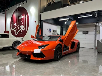 Lamborghini  Aventador  2013  Automatic  32,000 Km  12 Cylinder  Rear Wheel Drive (RWD)  Coupe / Sport  Orange