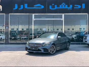 Mercedes-Benz  C-Class  200 AMG  2020  Automatic  85,000 Km  4 Cylinder  Rear Wheel Drive (RWD)  Sedan  Gray