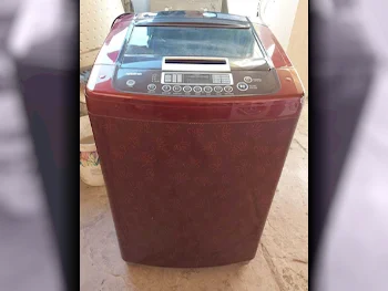 غسالة ملابس & الكل في واحد ال جي \  غسالة تحميل علوي  أحمر  متصلة بالواي-فاي