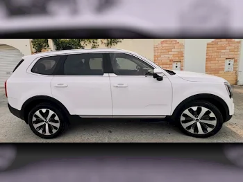 Kia  Telluride  EX  2021  Automatic  94,300 Km  6 Cylinder  All Wheel Drive (AWD)  SUV  White  With Warranty