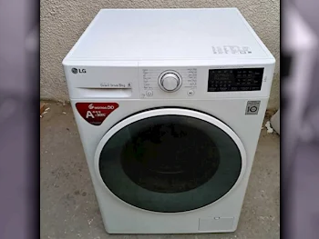 غسالة ملابس & الكل في واحد ال جي \  غسالة تحميل أمامي  أبيض